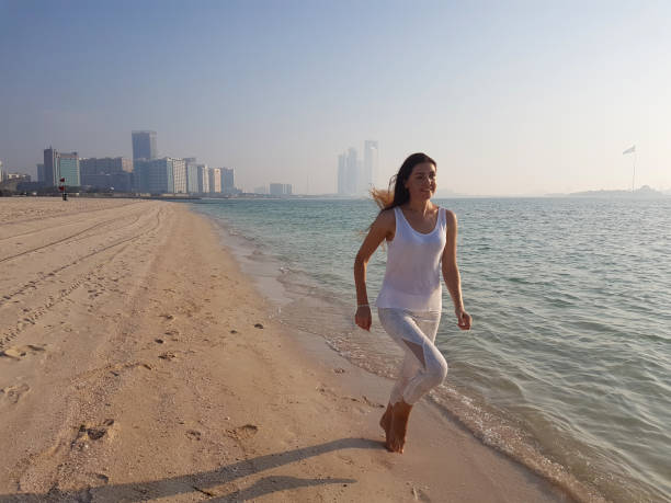 Expats enjoying the vibrant cityscape of Abu Dhabi, one of the best places to live for expats